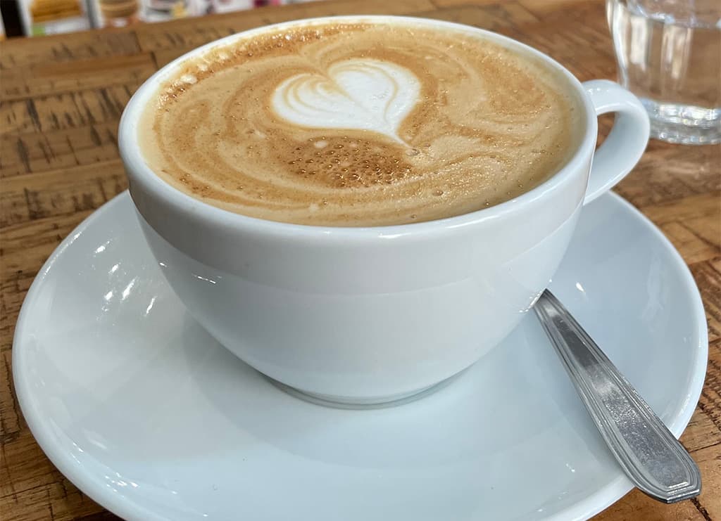 Cup of coffee with heart shape